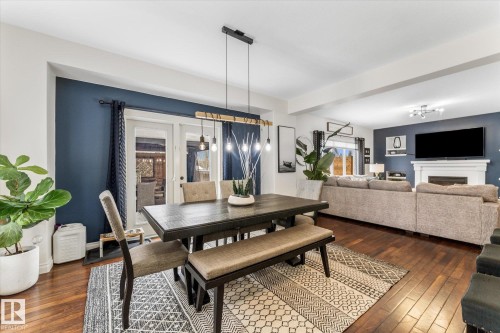 13 Heron Link, Spruce Grove, AB - Indoor Photo Showing Other Room With Fireplace