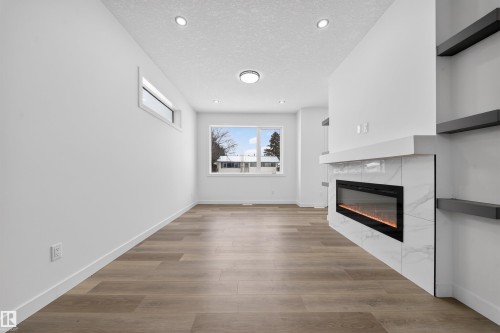 5213 104A Street, Edmonton, AB - Indoor With Fireplace