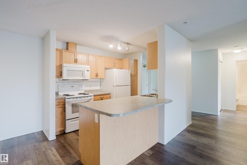 324 2903 Rabbit Hill Road, Edmonton, AB - Indoor Photo Showing Kitchen With Double Sink