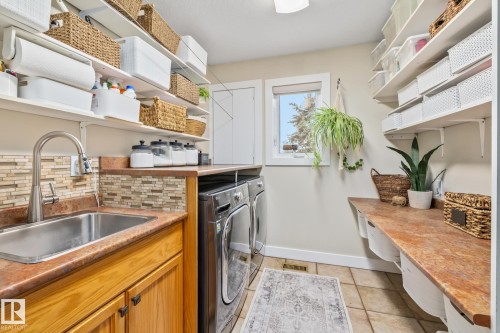 2 Discovery Avenue, Rural Sturgeon County, AB - Indoor Photo Showing Laundry Room