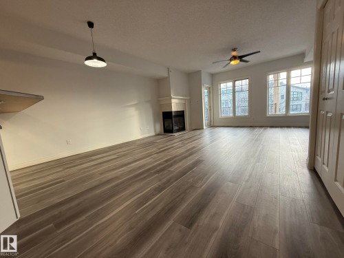 304 9803 96A Street, Edmonton, AB - Indoor With Fireplace
