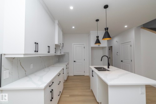 9805 106 Avenue, Morinville, AB - Indoor Photo Showing Kitchen With Double Sink With Upgraded Kitchen
