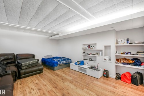 Bedroom with light wood-type flooring - 13335 106 Street, Edmonton, AB - Indoor