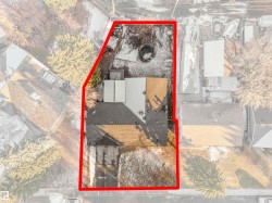 Aerial perspective of suburban area with property boundaries highlighted - 