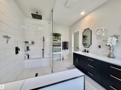 Full bathroom featuring vanity and walk in shower - 