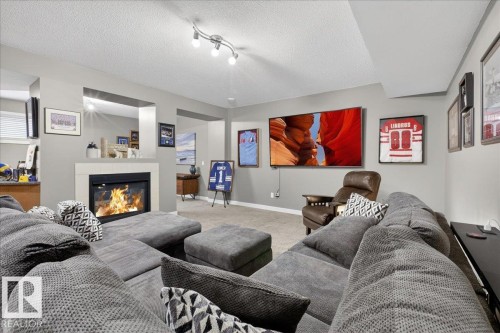 9 841 156 Street, Edmonton, AB - Indoor Photo Showing Living Room With Fireplace