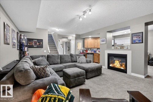 9 841 156 Street, Edmonton, AB - Indoor Photo Showing Living Room With Fireplace