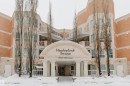 Snow covered property with a view of apartment building / complex - 406 9120 156 Street, Edmonton, AB  - Outdoor With Facade 