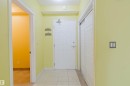 Doorway with tile patterned flooring and a textured ceiling - 406 9120 156 Street, Edmonton, AB  - Indoor Photo Showing Other Room 