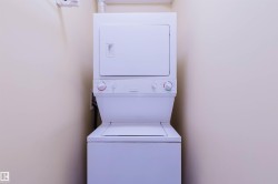 Laundry area featuring stacked washer / dryer - 