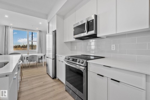 84 5 Rondeau Drive, St. Albert, AB - Indoor Photo Showing Kitchen With Stainless Steel Kitchen With Upgraded Kitchen