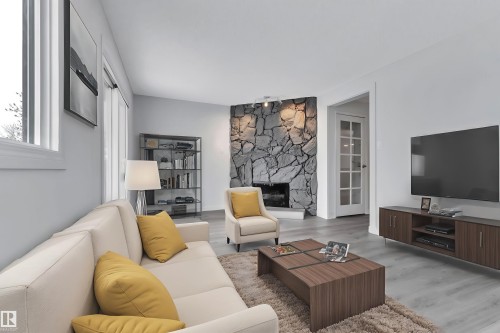 1281 Hooke Road, Edmonton, AB - Indoor Photo Showing Living Room With Fireplace