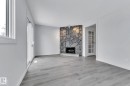 1281 Hooke Road, Edmonton, AB  - Indoor Photo Showing Living Room With Fireplace 