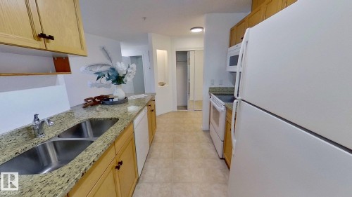 326 2903 Rabbit Hill Road, Edmonton, AB - Indoor Photo Showing Kitchen With Double Sink