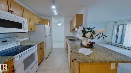 326 2903 Rabbit Hill Road, Edmonton, AB - Indoor Photo Showing Kitchen