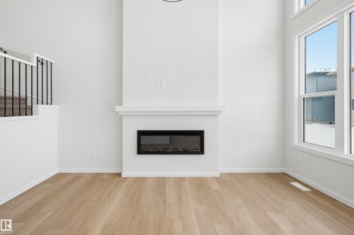 2535 211 Street, Edmonton, AB - Indoor Photo Showing Living Room With Fireplace