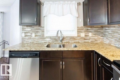 107 2045 Grantham Court, Edmonton, AB - Indoor Photo Showing Kitchen With Double Sink With Upgraded Kitchen