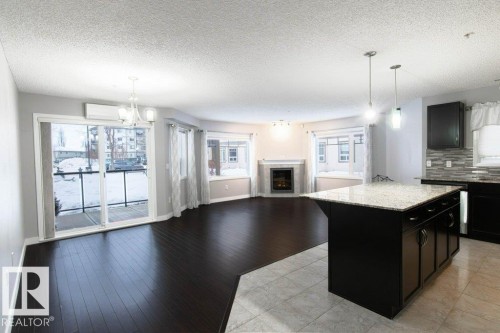107 2045 Grantham Court, Edmonton, AB - Indoor With Fireplace