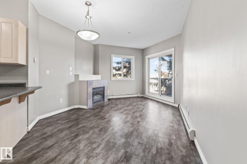 303 10118 95 Street, Edmonton, AB - Indoor With Fireplace