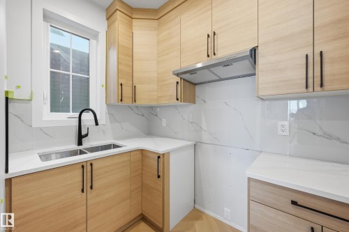 4 Eldridge Point(E), St. Albert, AB - Indoor Photo Showing Kitchen With Double Sink