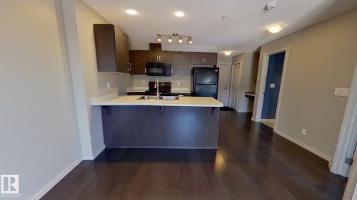 234 5515 7 Avenue, Edmonton, AB - Indoor Photo Showing Kitchen With Double Sink