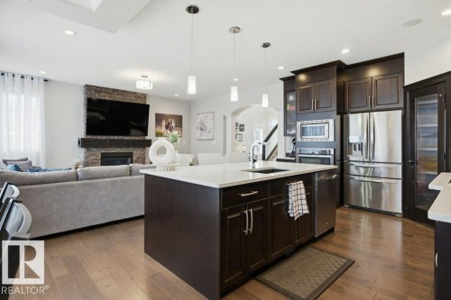 2603 Bluejay Close, Edmonton, AB - Indoor Photo Showing Kitchen With Fireplace With Stainless Steel Kitchen With Upgraded Kitchen