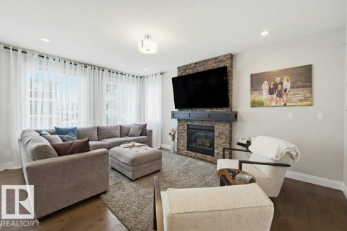 2603 Bluejay Close, Edmonton, AB - Indoor Photo Showing Living Room With Fireplace