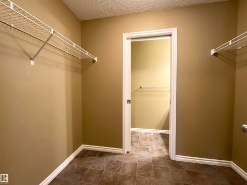 33 9350 211 Street, Edmonton, AB - Indoor With Storage