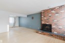 16026 94A Avenue, Edmonton, AB  - Indoor Photo Showing Living Room With Fireplace 