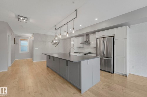 228 10407 122 Street, Edmonton, AB - Indoor Photo Showing Kitchen With Stainless Steel Kitchen With Upgraded Kitchen