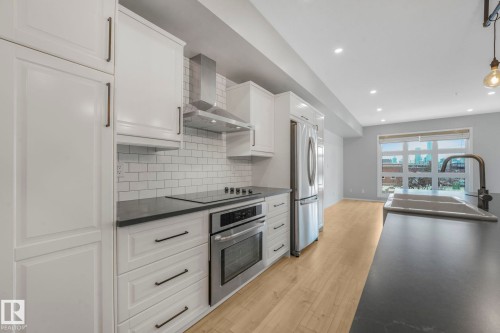 228 10407 122 Street, Edmonton, AB - Indoor Photo Showing Kitchen With Stainless Steel Kitchen With Upgraded Kitchen