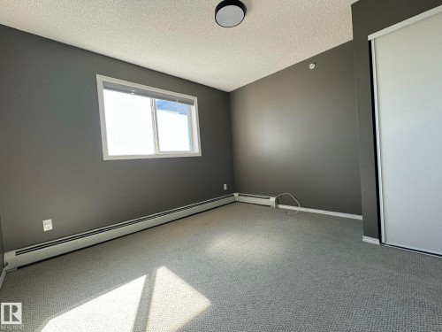 516 2430 Guardian Road, Edmonton, AB - Indoor Photo Showing Other Room