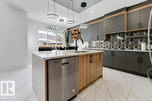 5814 Peltier Close, Beaumont, AB - Indoor Photo Showing Kitchen With Double Sink