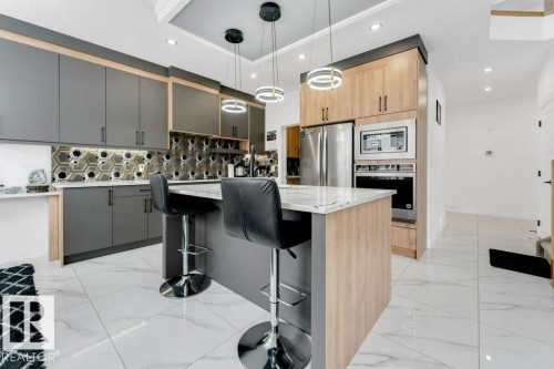 5814 Peltier Close, Beaumont, AB - Indoor Photo Showing Kitchen With Upgraded Kitchen