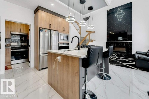 5814 Peltier Close, Beaumont, AB - Indoor Photo Showing Kitchen