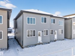 Snow covered property with entry steps - 