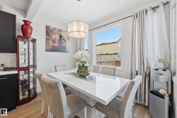 Dining room with light wood-type flooring - 