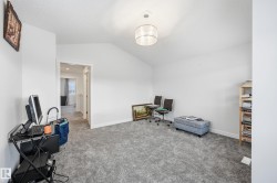 Unfurnished office with lofted ceiling and carpet - 