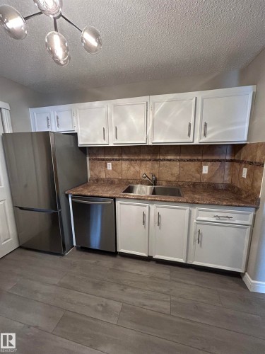 53 14620 26 Street, Edmonton, AB - Indoor Photo Showing Kitchen With Double Sink