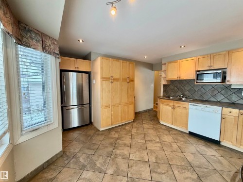 11914 40 Street, Edmonton, AB - Indoor Photo Showing Kitchen With Double Sink