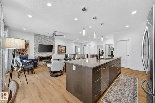 20017 128A Avenue, Edmonton, AB - Indoor Photo Showing Kitchen With Fireplace With Upgraded Kitchen