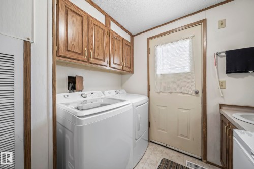 39 Norby Crescent, Red Deer, AB - Indoor Photo Showing Laundry Room