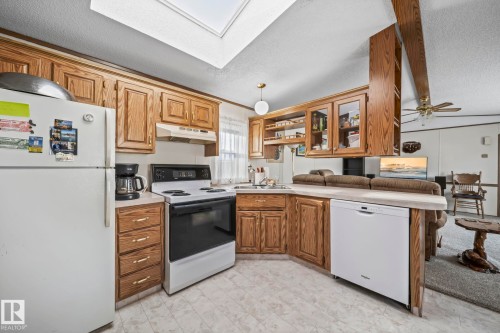 39 Norby Crescent, Red Deer, AB - Indoor Photo Showing Kitchen With Double Sink
