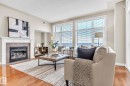 706 9020 Jasper Avenue, Edmonton, AB  - Indoor Photo Showing Living Room With Fireplace 