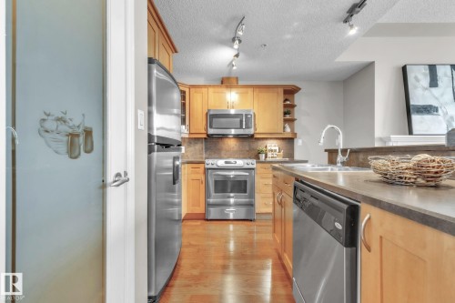 706 9020 Jasper Avenue, Edmonton, AB - Indoor Photo Showing Kitchen With Double Sink
