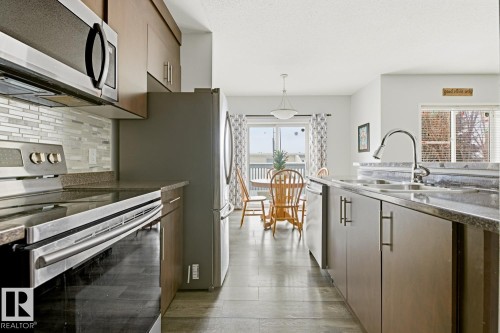 59 843 Youville Drive W, Edmonton, AB - Indoor Photo Showing Kitchen With Double Sink With Upgraded Kitchen