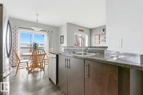 59 843 Youville Drive W, Edmonton, AB - Indoor Photo Showing Kitchen With Double Sink