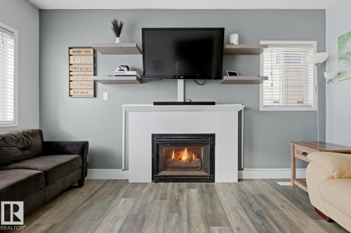 59 843 Youville Drive W, Edmonton, AB - Indoor Photo Showing Living Room With Fireplace