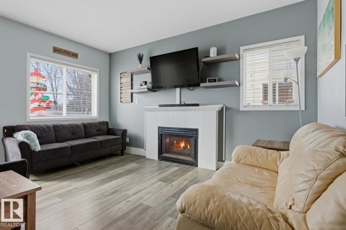 59 843 Youville Drive W, Edmonton, AB - Indoor Photo Showing Living Room With Fireplace