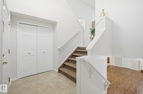 Stairway featuring baseboards - 608 87 St, Edmonton, AB - Indoor Photo Showing Other Room